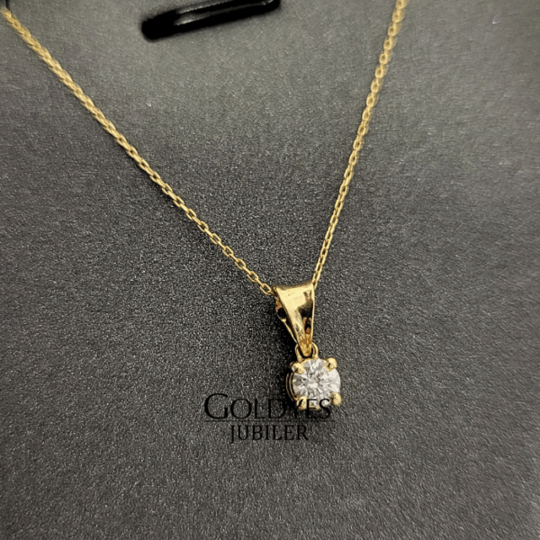 Złoty naszyjnik z diamentem 0,15 ct - ponadczasowa klasyka