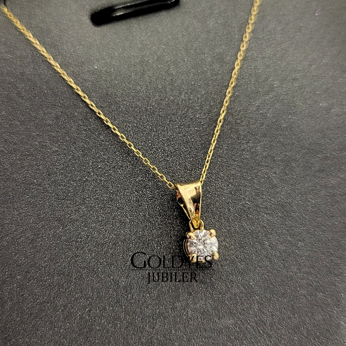 Złoty naszyjnik z diamentem 0,15 ct - ponadczasowa klasyka